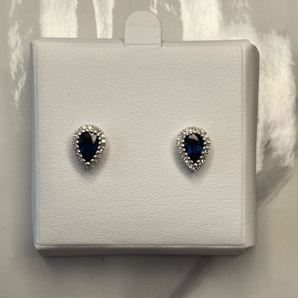 Sapphire (9/10 ct. t.w.) and Diamond (1/8 ct. t.w.) Stud Earrings in 14KWG